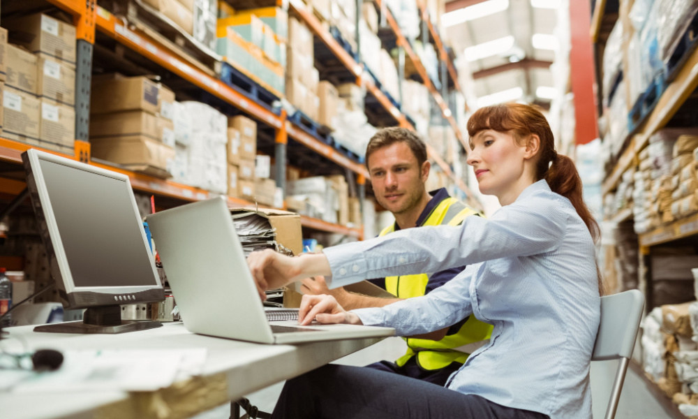 Warehouse workers using Microsoft Dynamics ERP